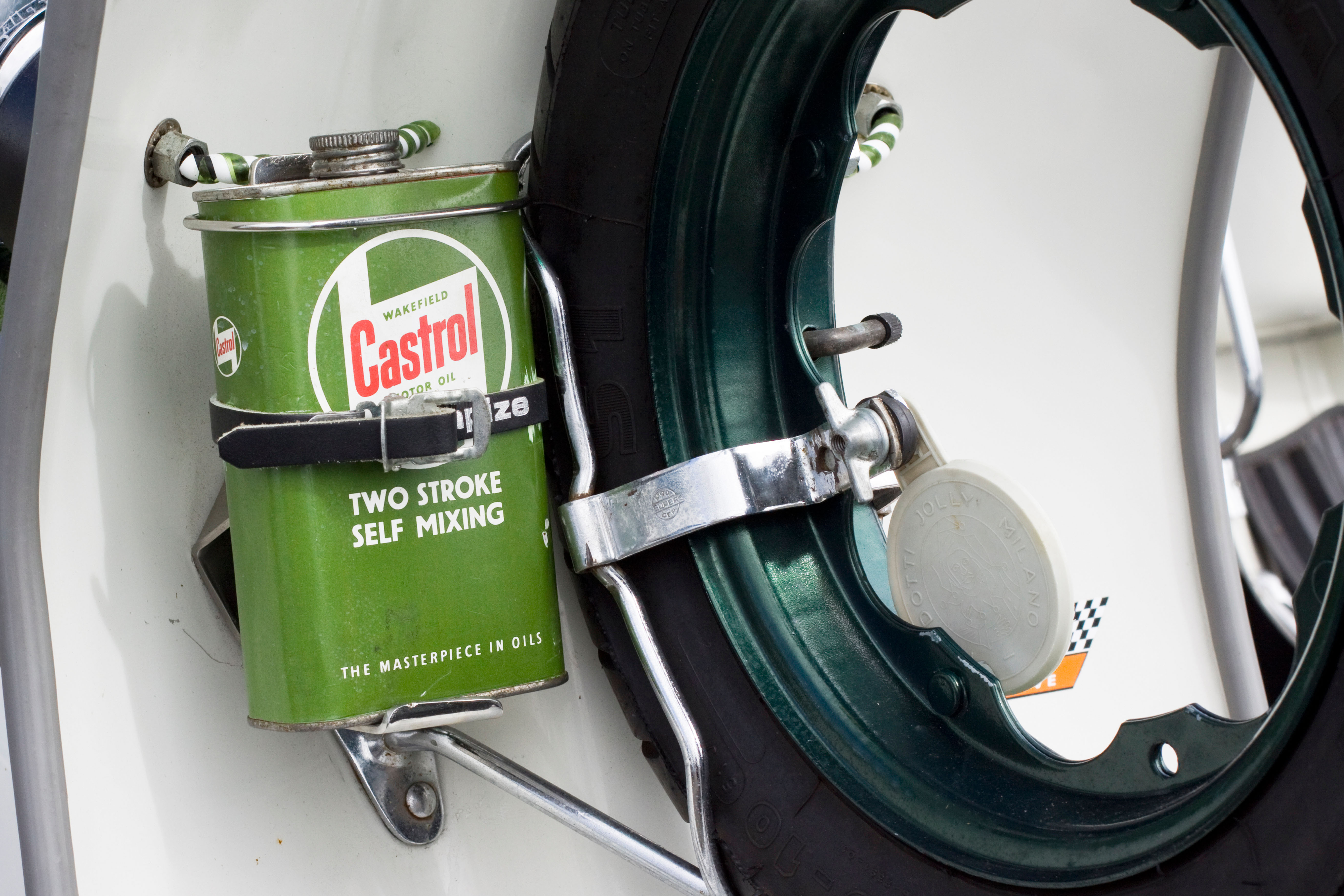 Castrol oil tin on a Vespa moped.