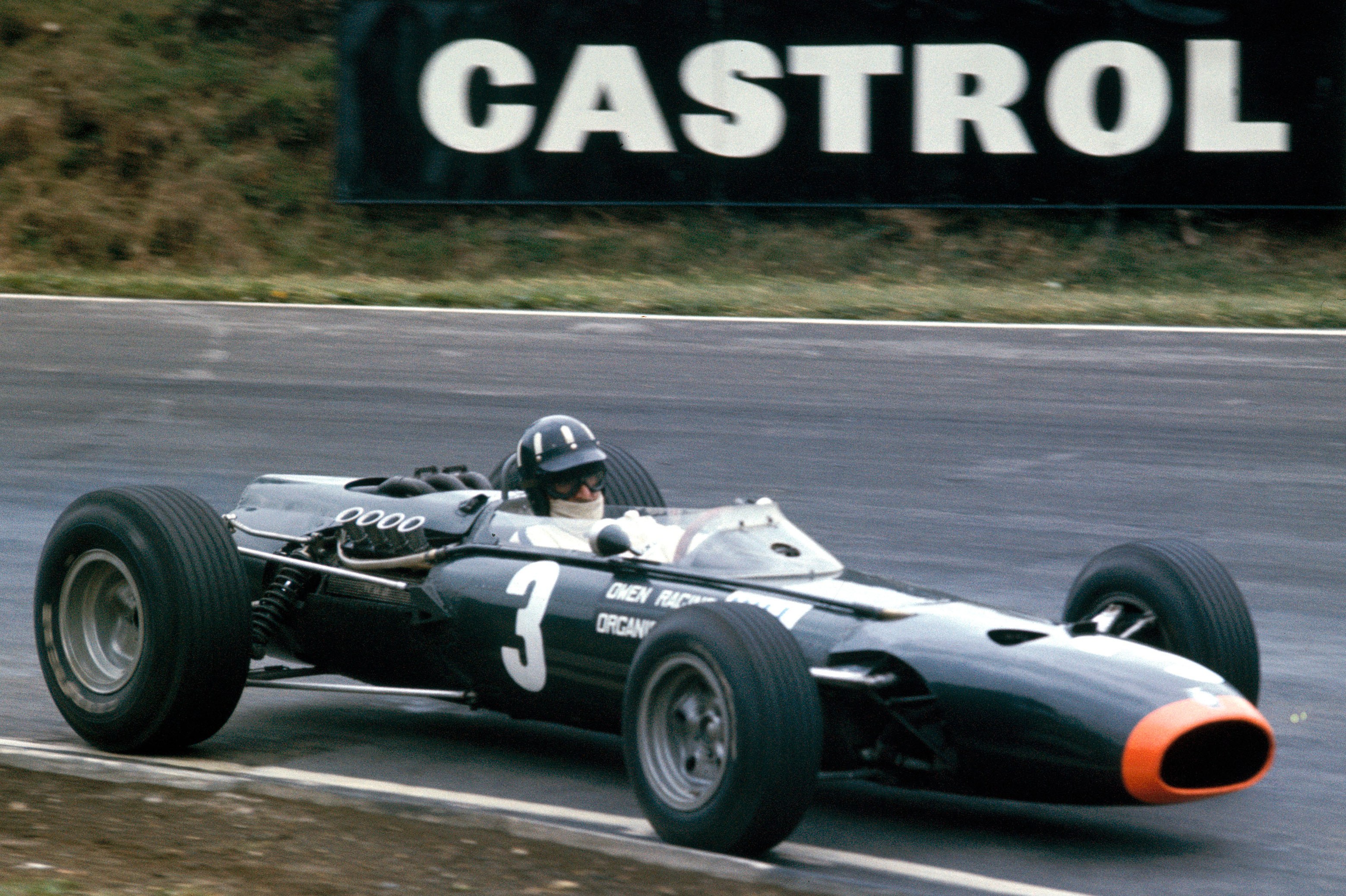 Graham Hill racing a BRM P261 at the 1966 British Grand Prix.
