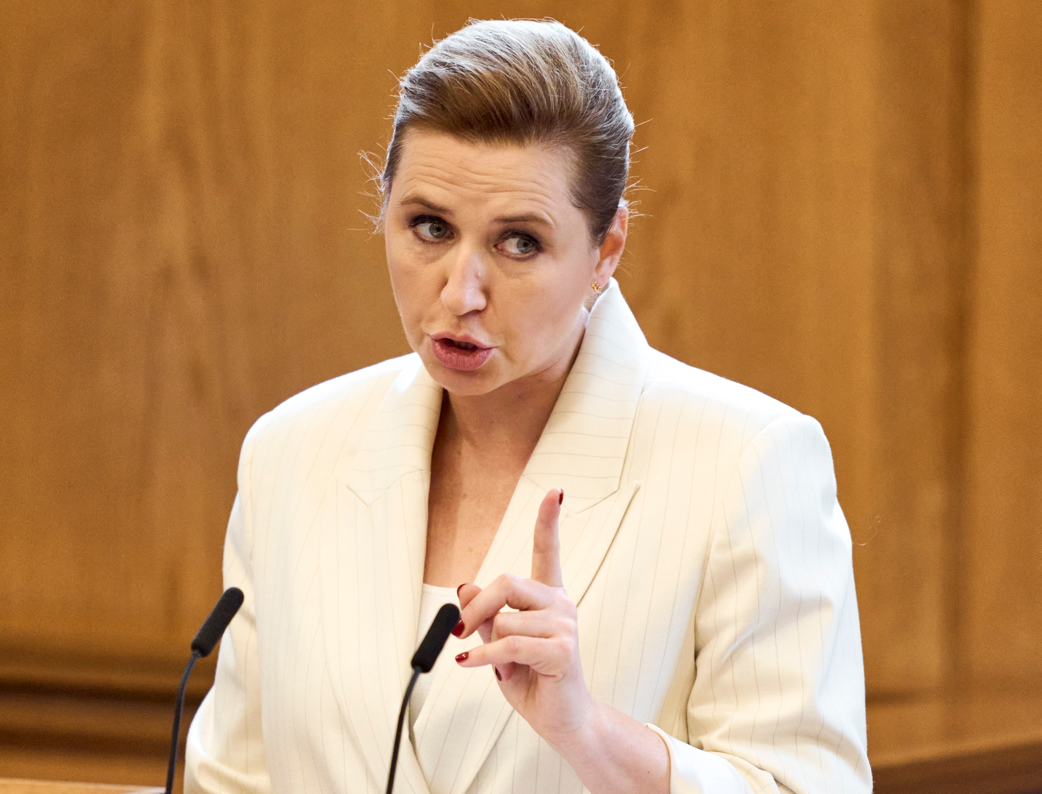Danish Prime Minister Mette Frederiksen addressing a parliamentary debate.
