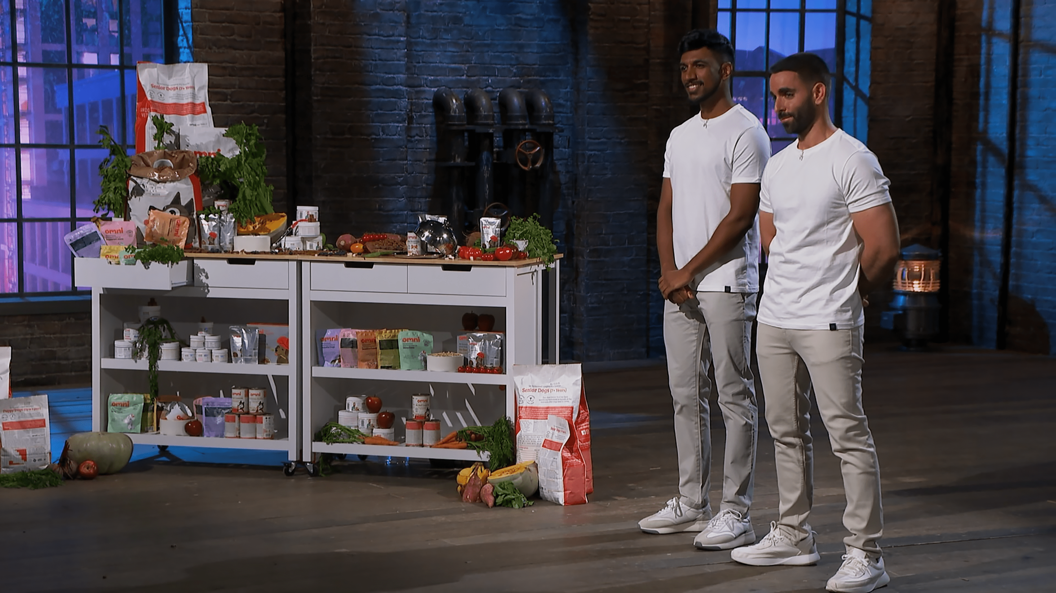Omni founders on BBC Dragons' Den, presenting their dog food.